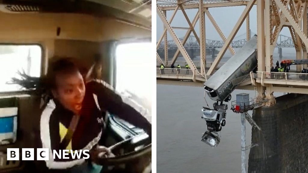 New video shows crash that left truck dangling off bridge - BBC.com
